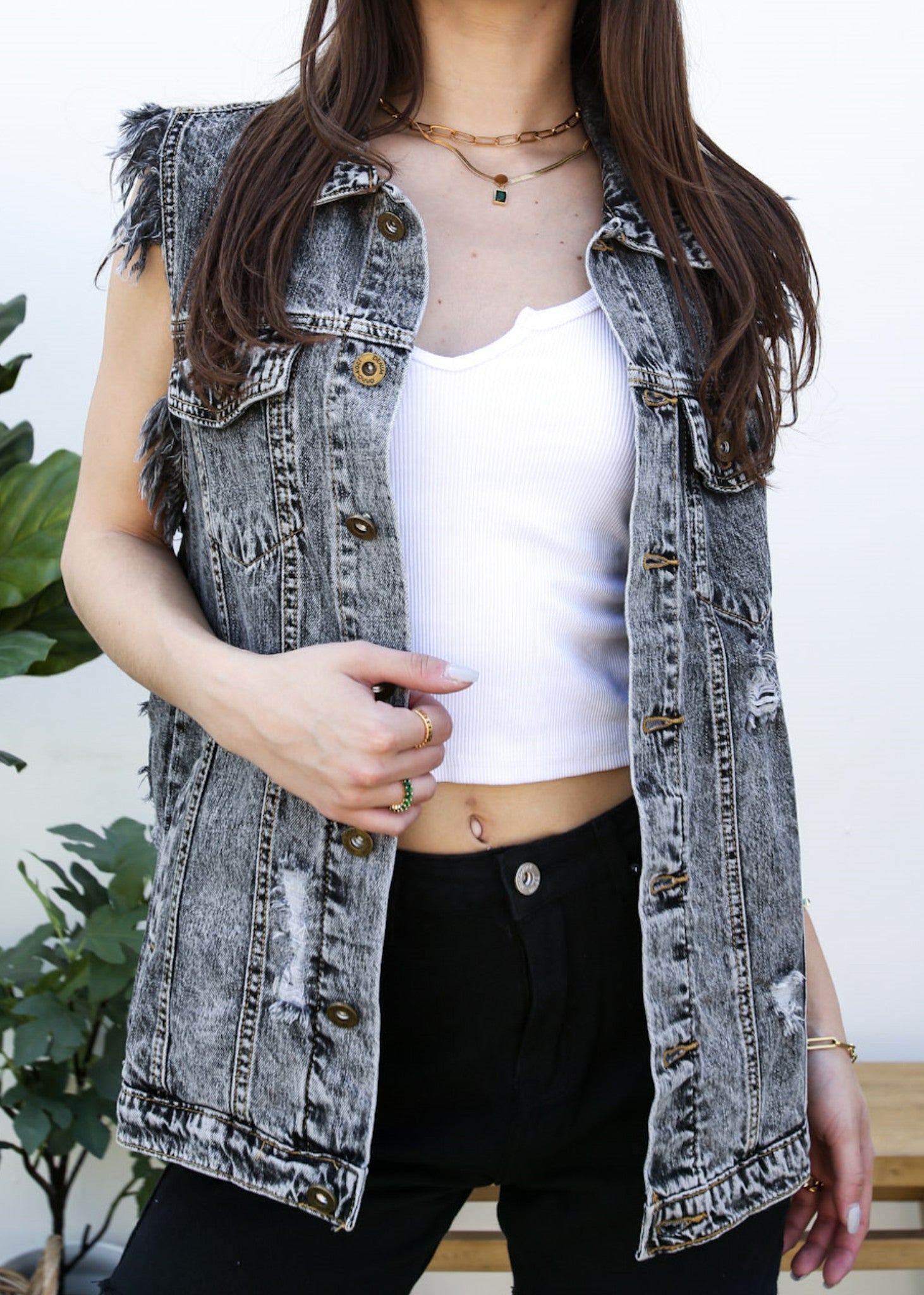 Distressed black store denim vest