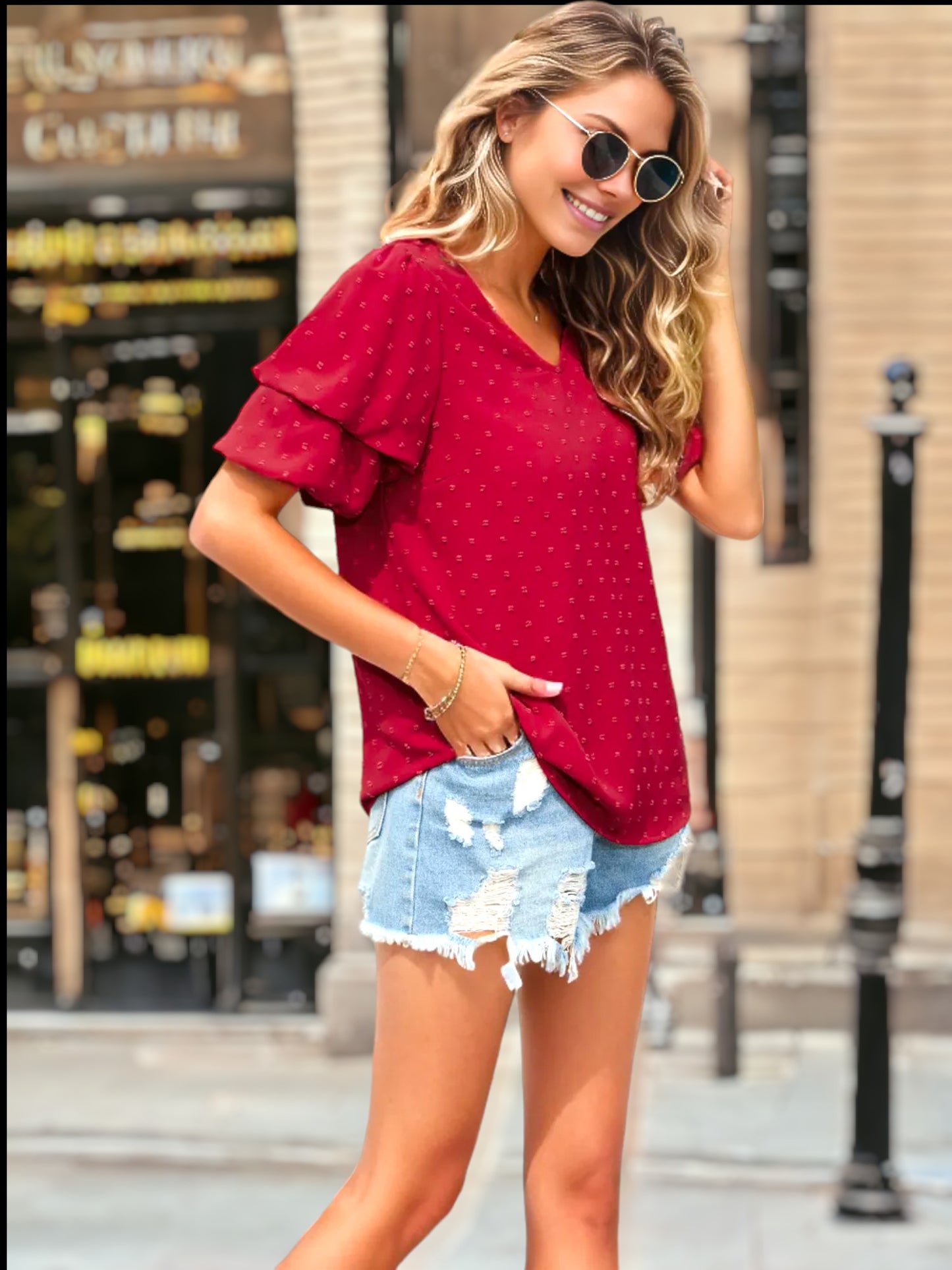 Blusa con escote en V y mangas abullonadas dobles