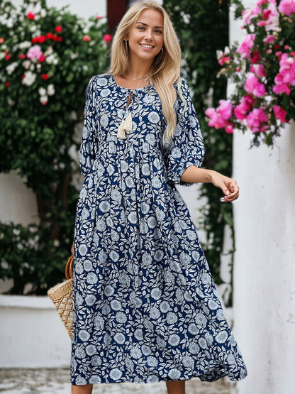 Vestido midi con cuello anudado y borlas