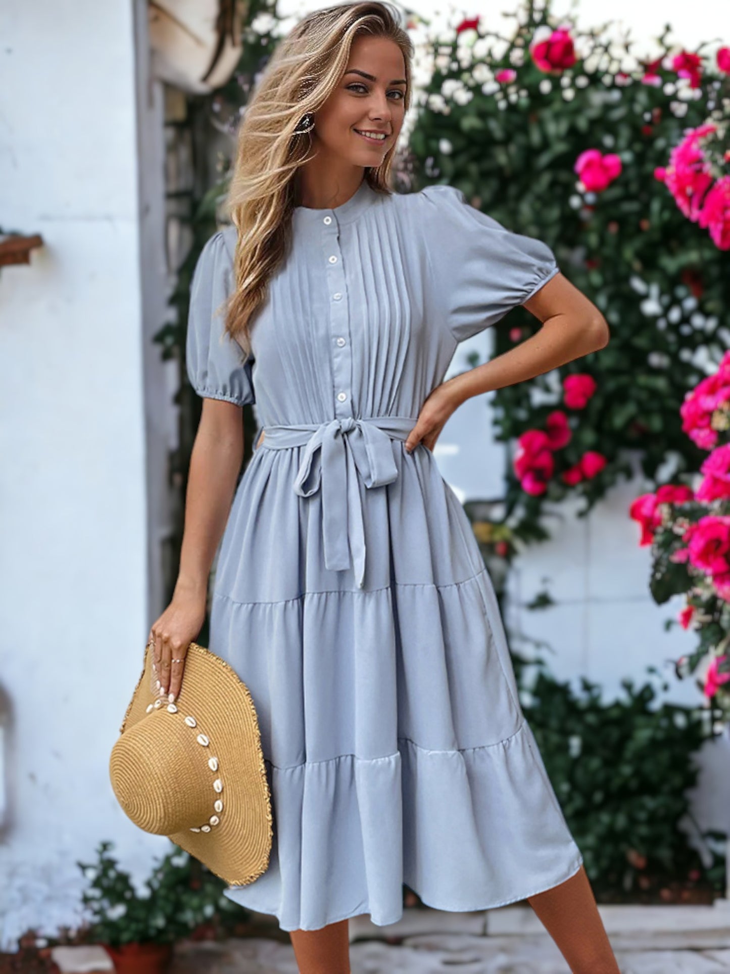 Vestido con volantes, mangas abullonadas y cintura anudada