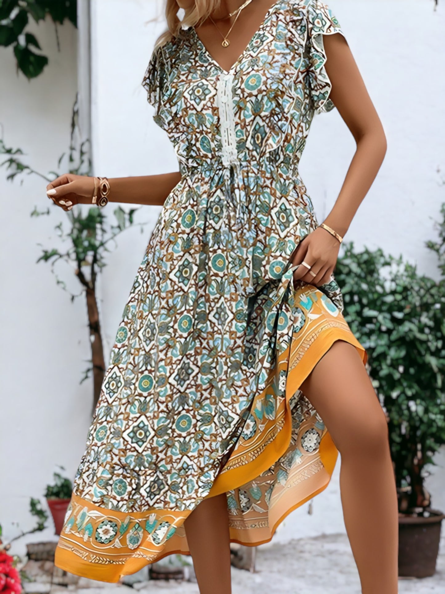 Vestido bohemio con escote en V y mangas abullonadas