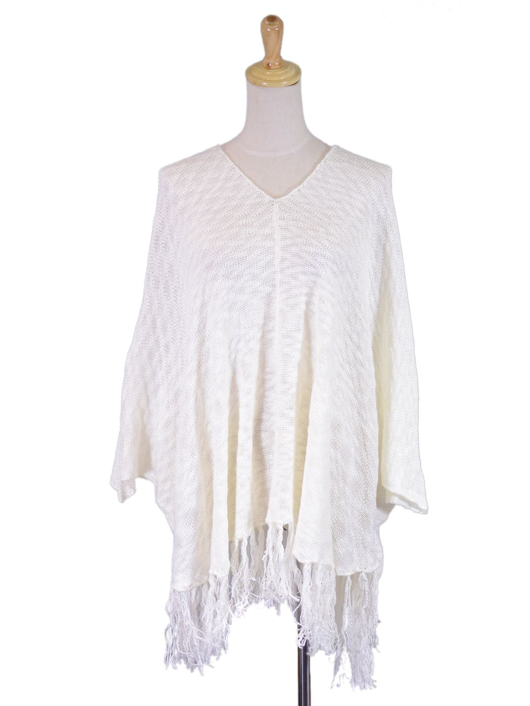 Poncho de punto ligero con capucha y dobladillo con flecos En Creme Boho Free Your Spirit