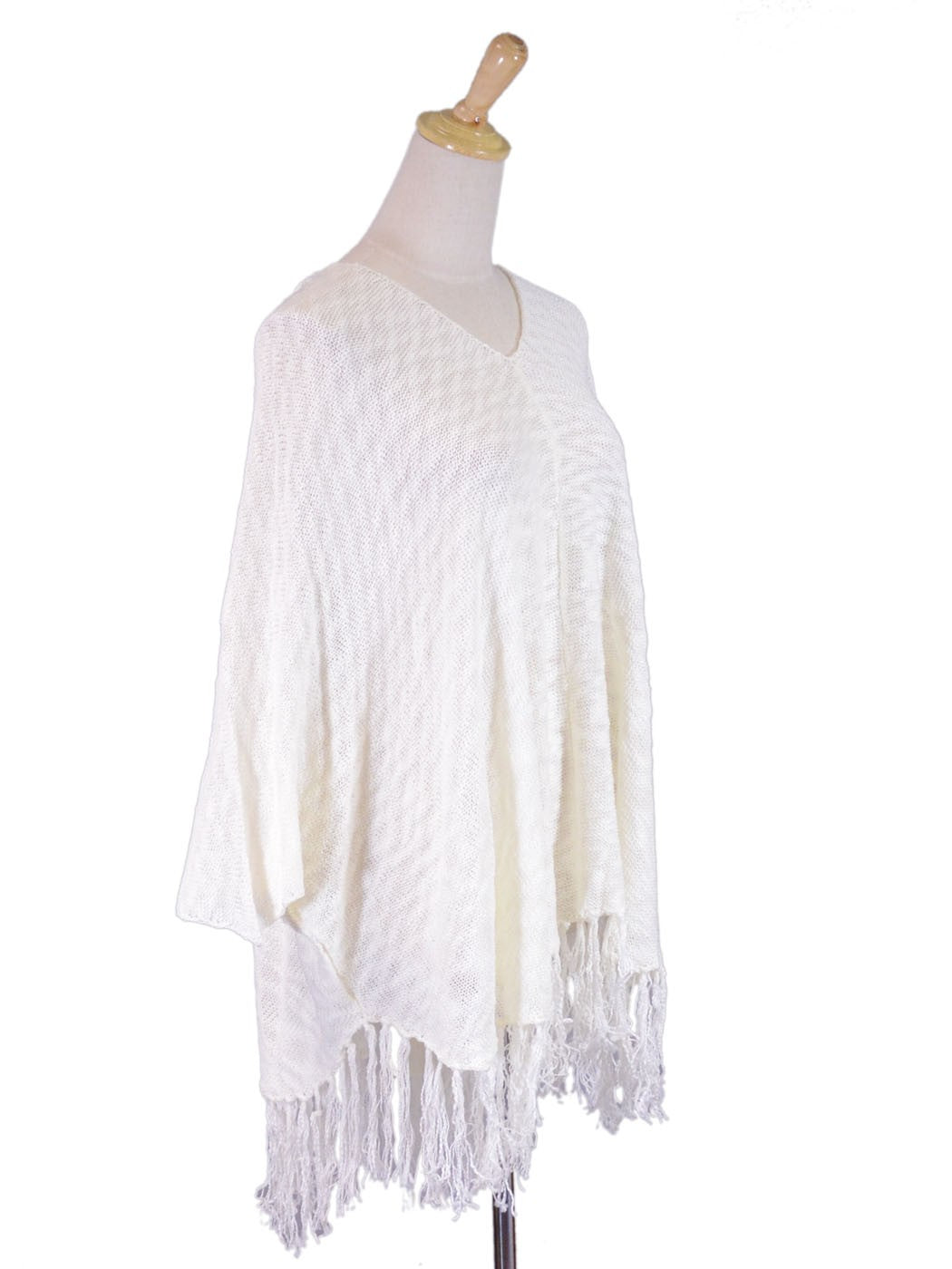 Poncho de punto ligero con capucha y dobladillo con flecos En Creme Boho Free Your Spirit