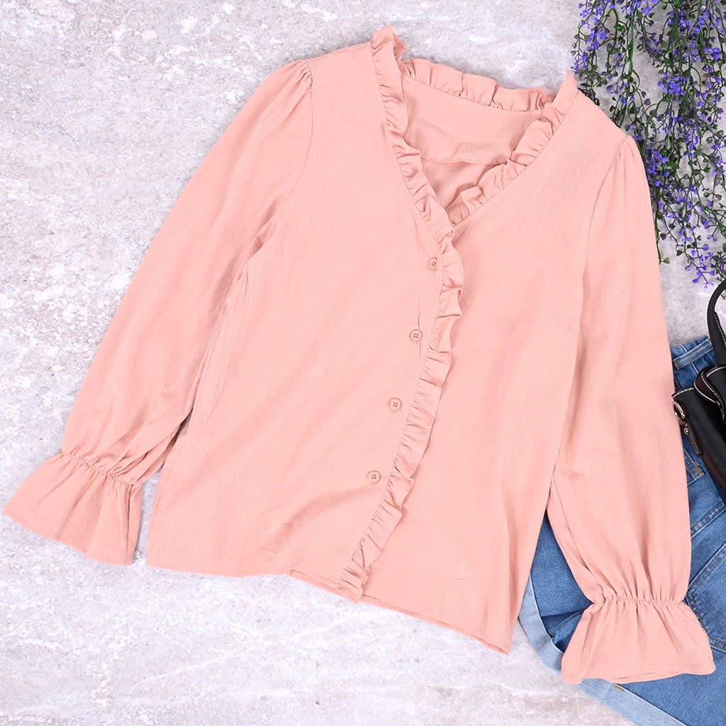 Blusa con botones y ribete de volantes