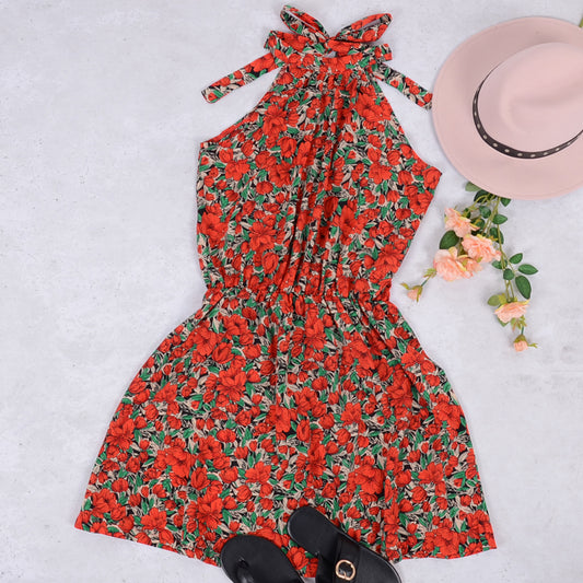 Vestido mini con cuello halter, cintura elástica, sin mangas y estampado floral estilo bohemio con lazo en la espalda