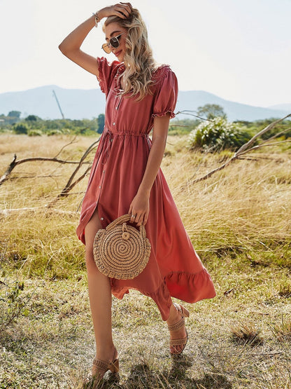 Vestido con volantes y mangas abullonadas