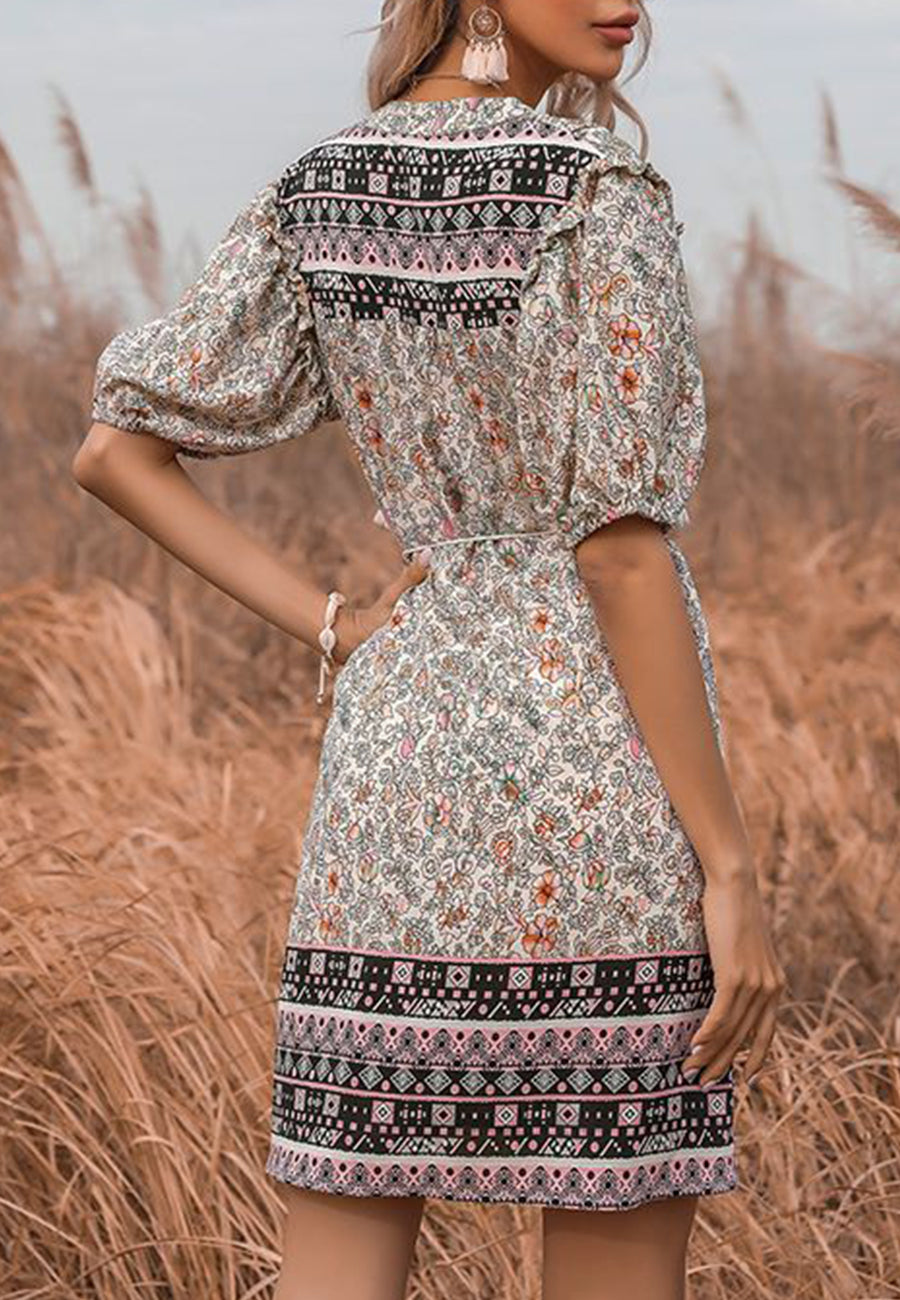 Vestido midi bohemio con detalle de lazo y borlas