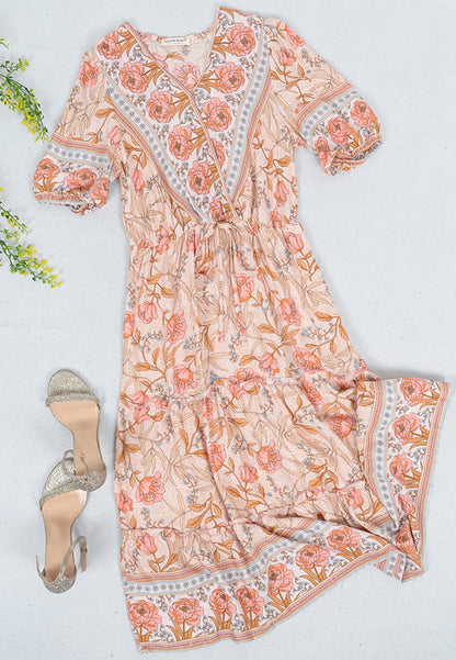 Vestido bohemio con estampado floral y mangas abullonadas