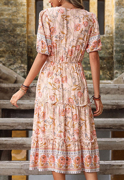 Vestido bohemio con estampado floral y mangas abullonadas