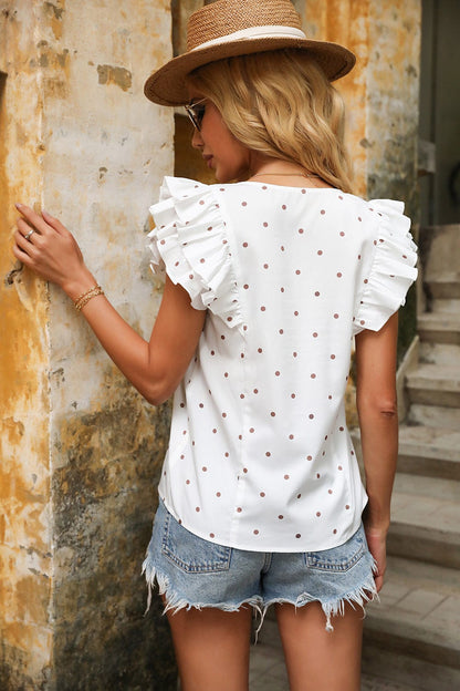 Blusa con estampado mixto y mangas con volantes