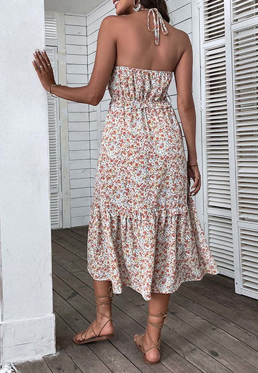 Vestido floral con cuello halter y lazo en la espalda